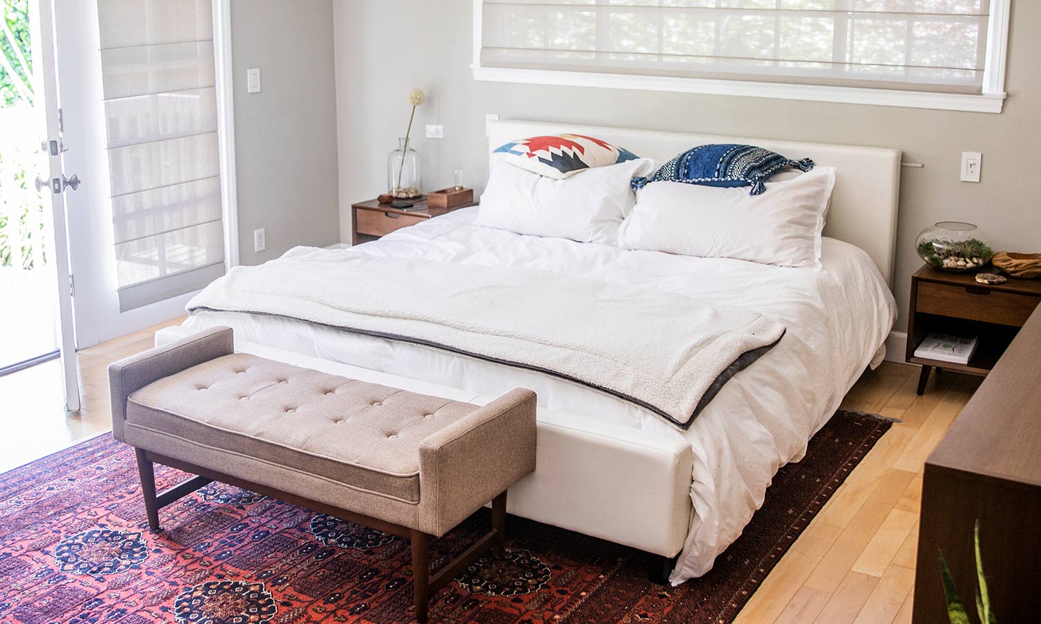 guest bedroom with a colorful rug 