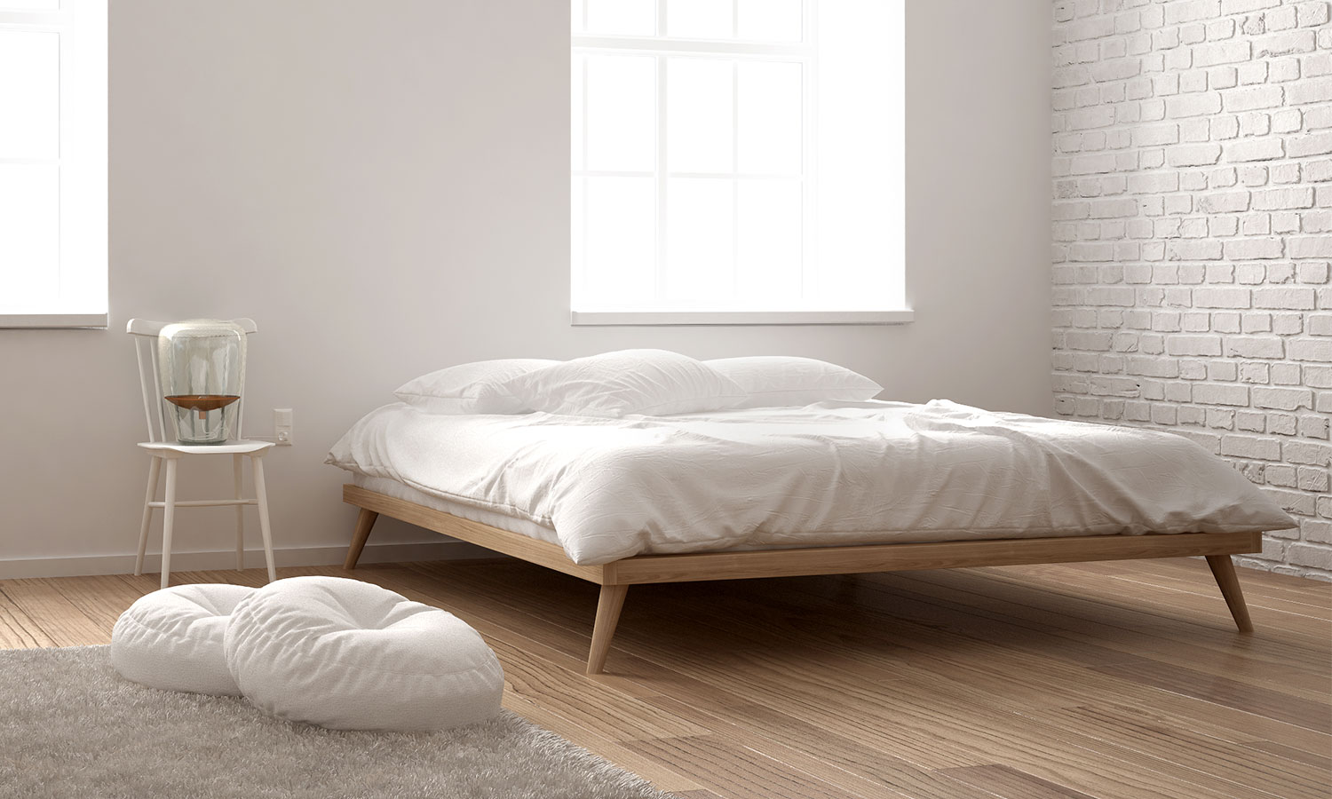 A bed with legs and a platform, no headboard or footer.